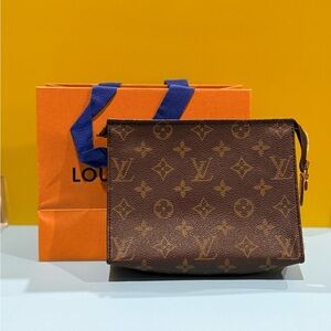 LOUIS VUITTON Monogram Pochette Voyage Brown